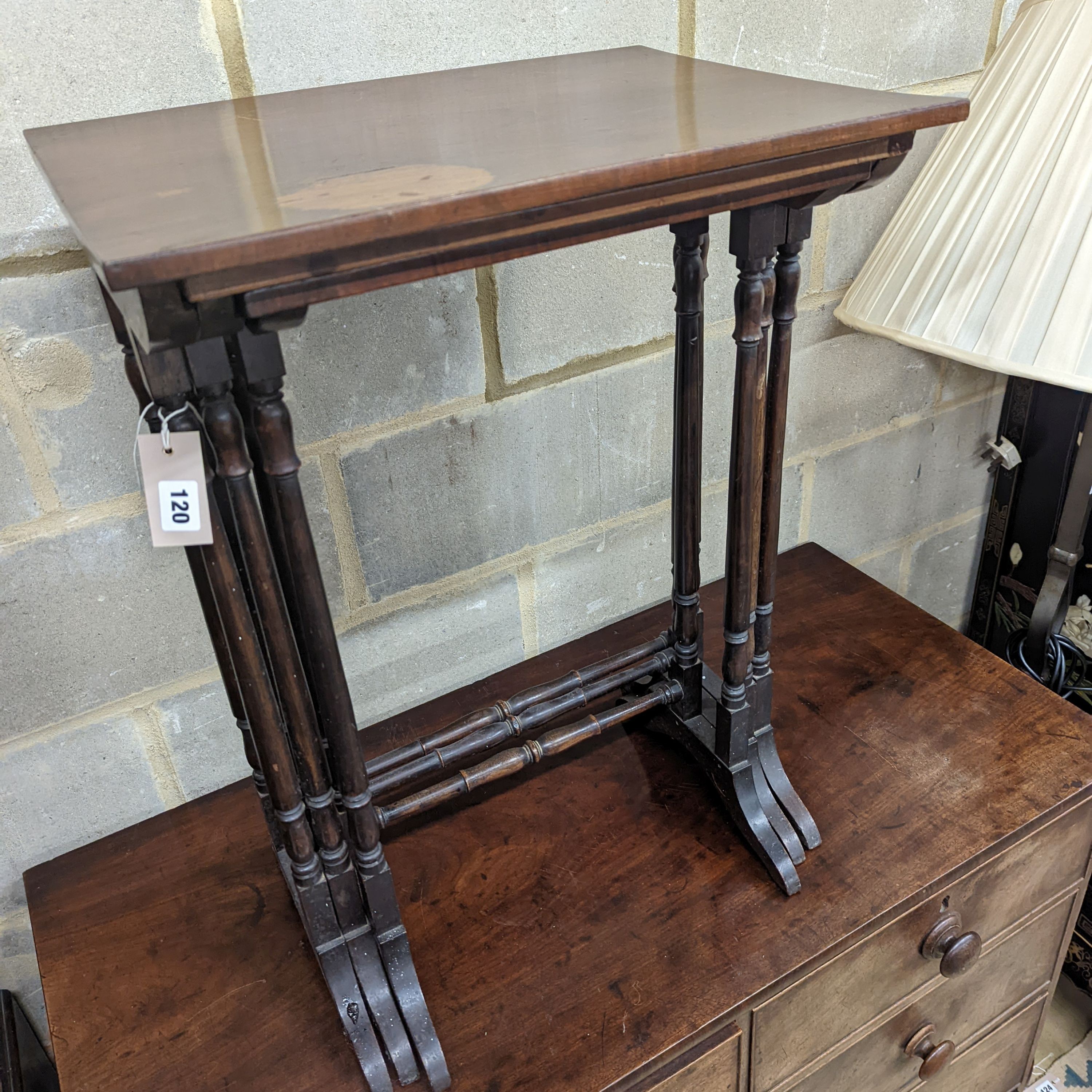 A nest of three Edwardian rectangular mahogany tea tables, width 52cm, depth 38cm, height 71cm